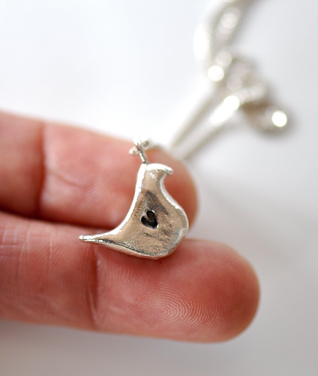 Silver Dainty Bird Charm necklace, bird with heart charm, unique Whimsical jewelry, made in Barcelona