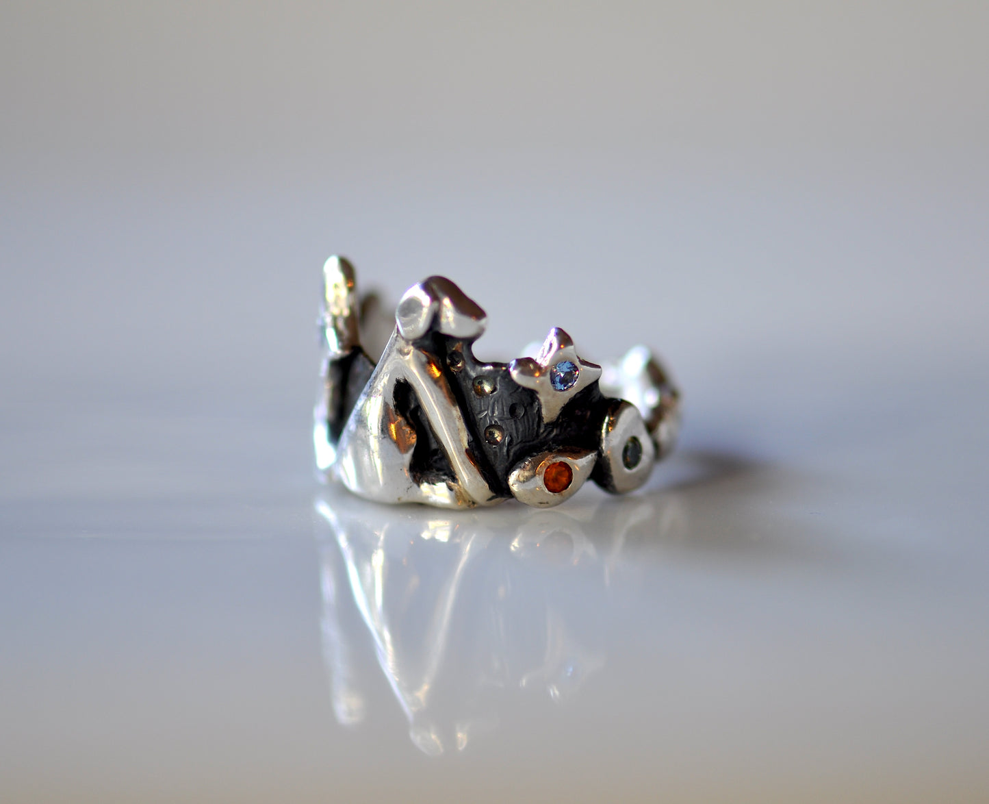 Chunky handmade sterling silver dog ring with colorful natural gemstones, made in Barcelona