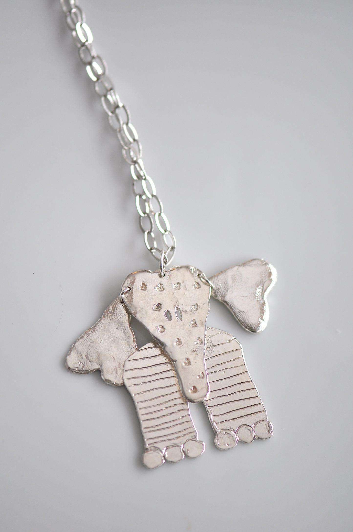 articulated silver elephant pendant
