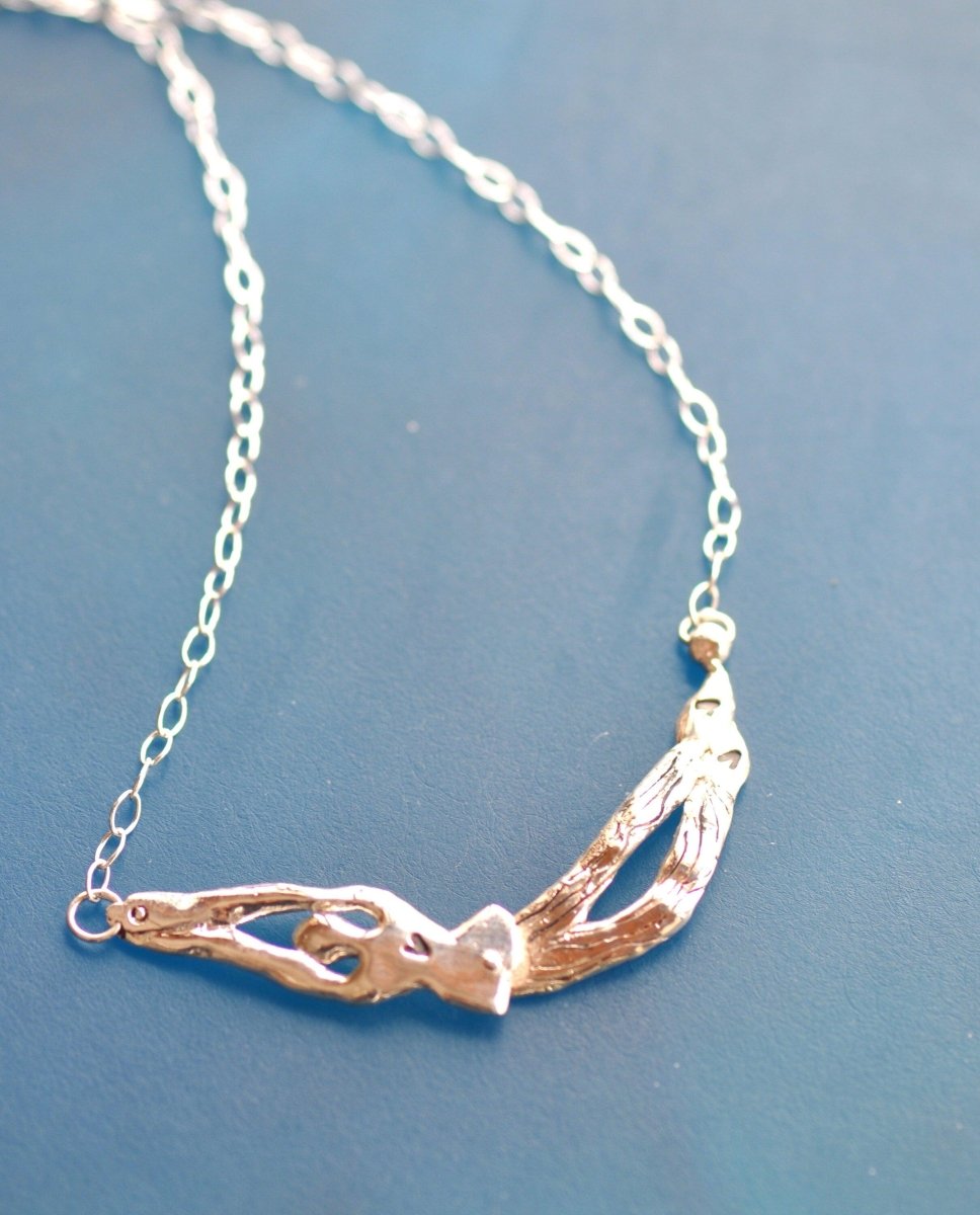 articulated silver clown in chain