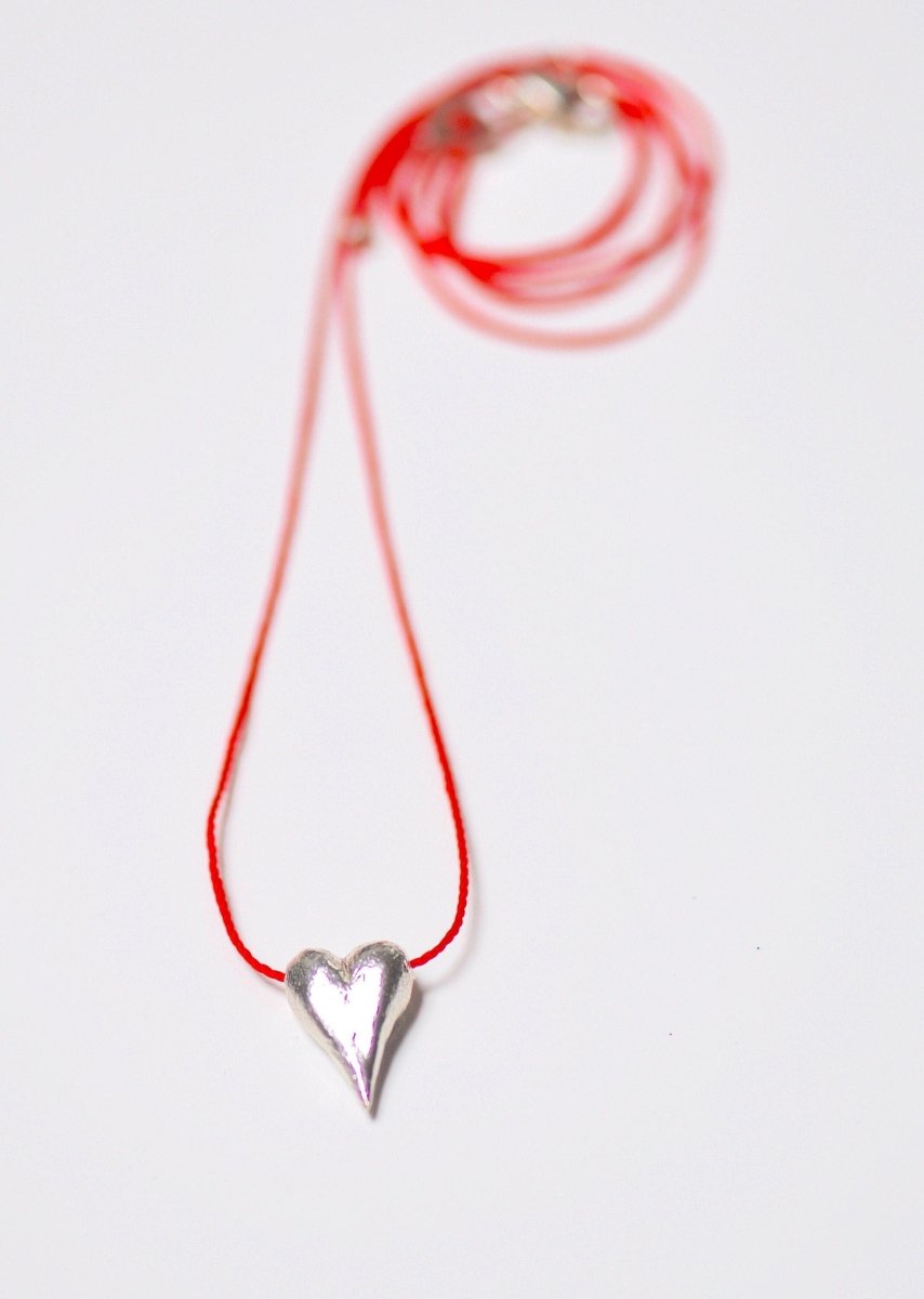 Handmade sterling silver heart drop charm necklace on adjustable red cord, unique heart jewelry