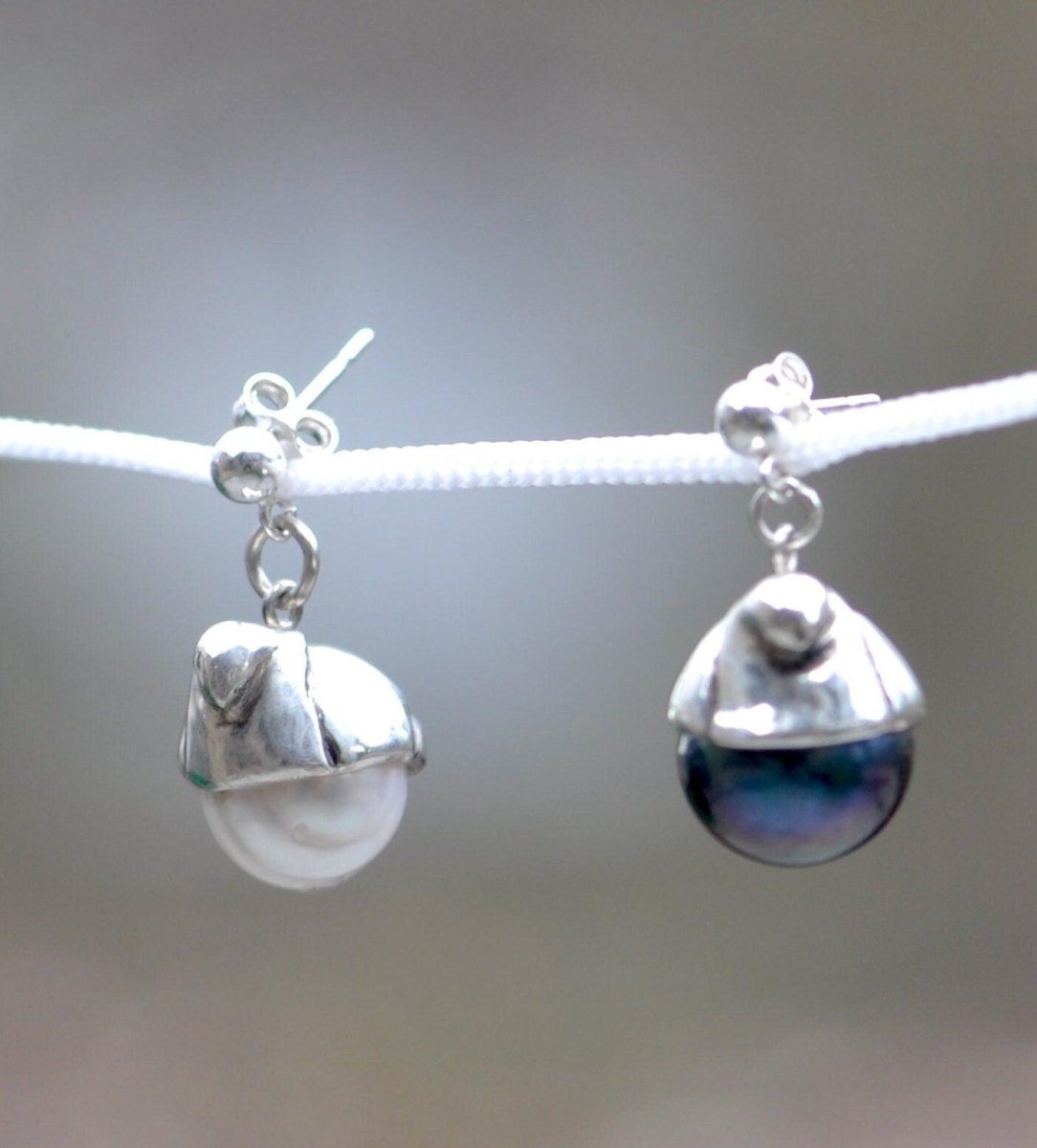 silver birds with black and white pearls dangle earrings
