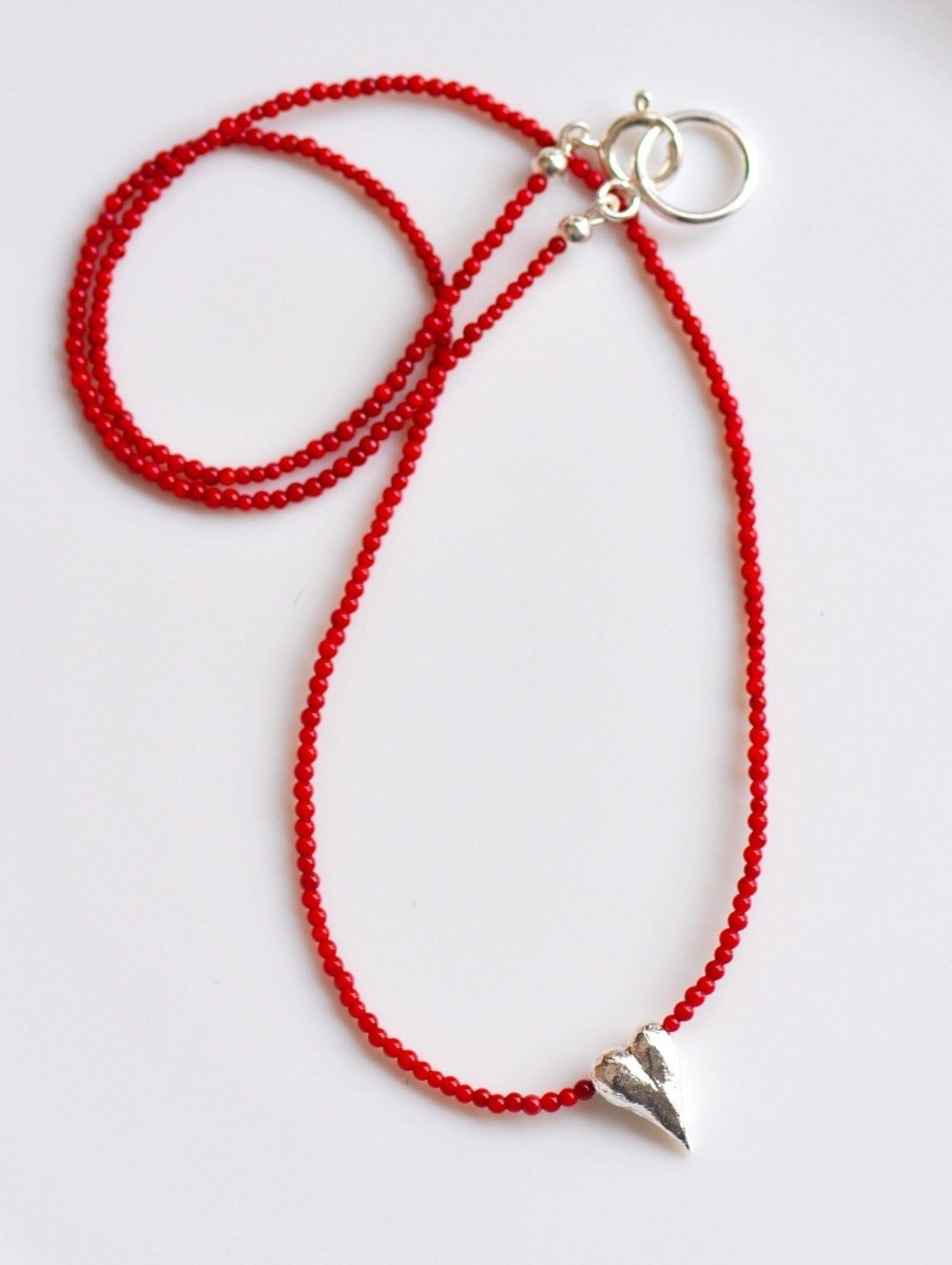 Handmade red coral beaded necklace with sterling silver sculptural heart charm, unique heart jewelry