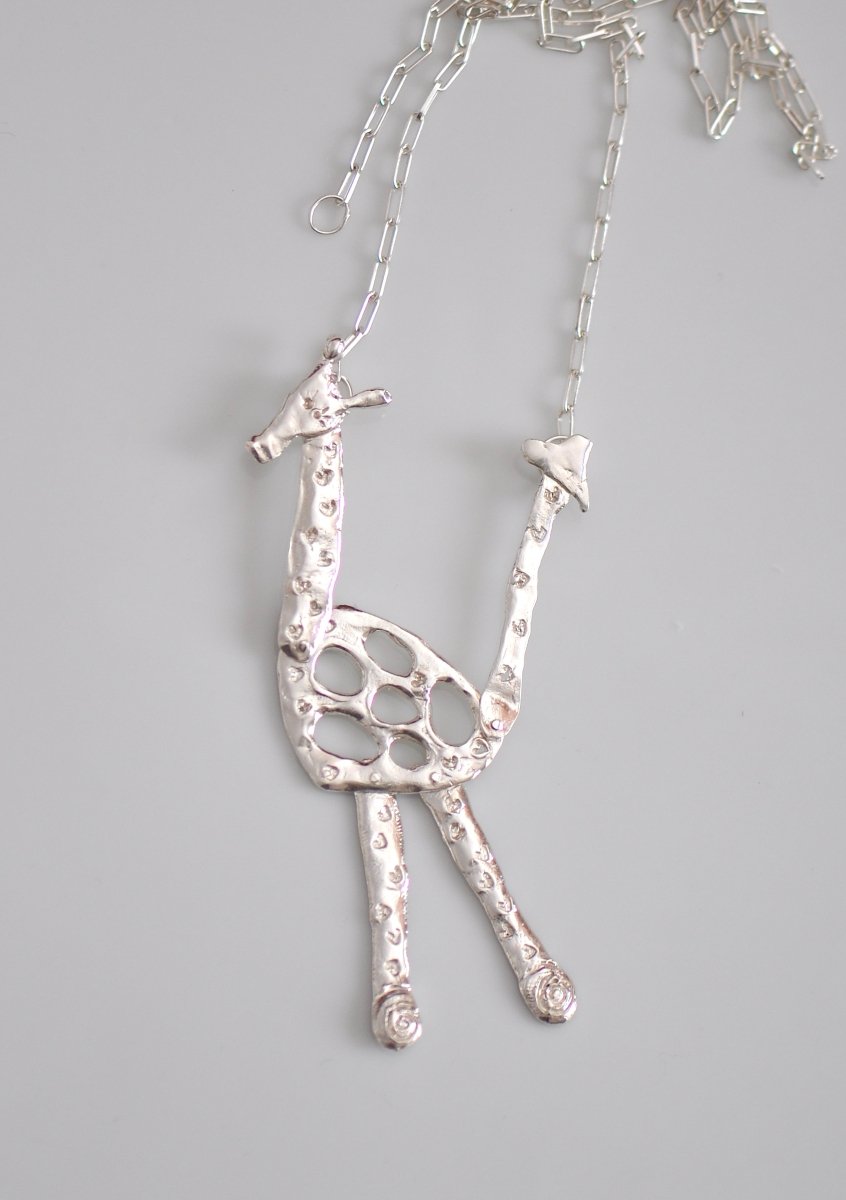 Handmade sterling silver articulated giraffe pendant necklace, whimsical animal jewelry, made in Barcelona