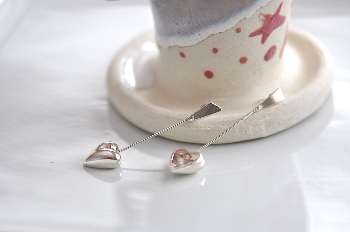 Handmade sterling silver big heart dangle earrings with reversible hollow and solid design, whimsical heart jewelry
