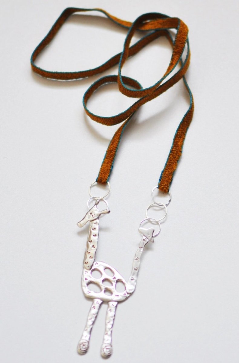 Handmade sterling silver articulated giraffe pendant necklace, whimsical animal jewelry, made in Barcelona