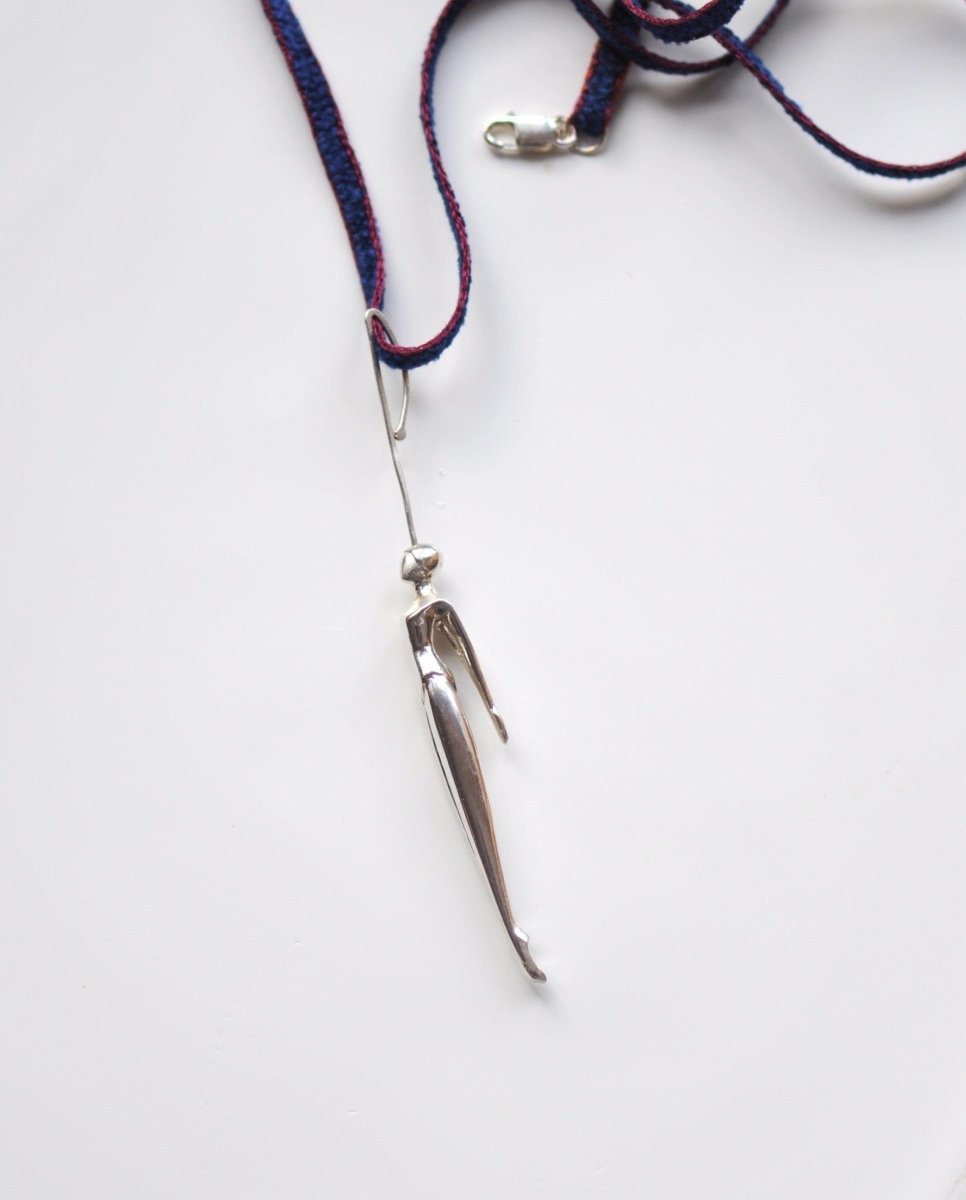 Handmade sterling silver artistic swimmer pendant necklace, elongated female figure wearable sculpture, made in Barcelona