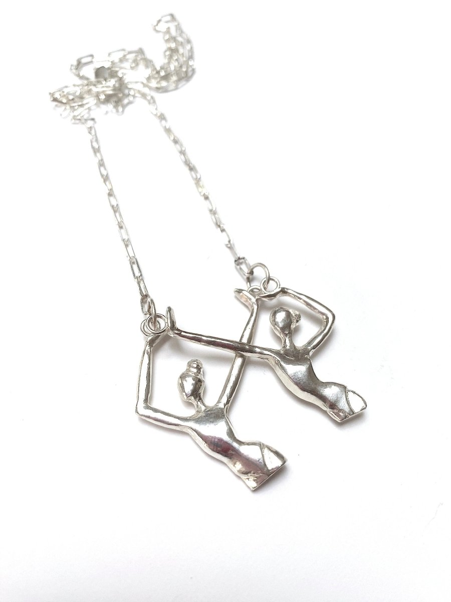 Handmade sterling silver ballerina duo charm necklace with two dancer pendants, whimsical dance jewelry