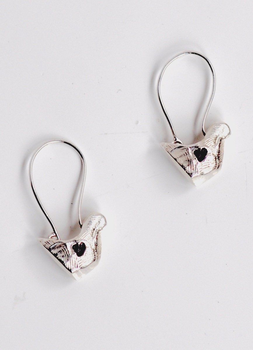 Handmade sterling silver bird charm earrings, whimsical nature jewelry, made in Barcelona
