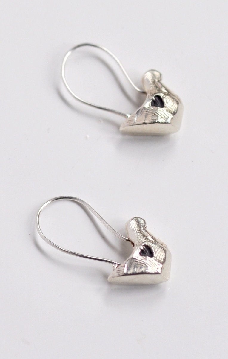 Handmade sterling silver bird charm earrings, whimsical nature jewelry, made in Barcelona