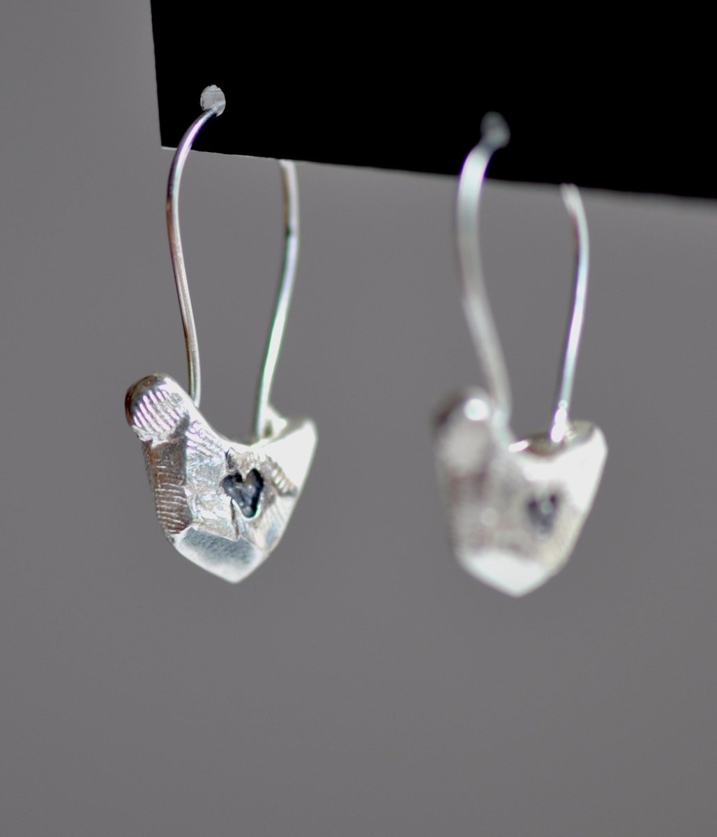 Handmade sterling silver bird charm earrings, whimsical nature jewelry, made in Barcelona