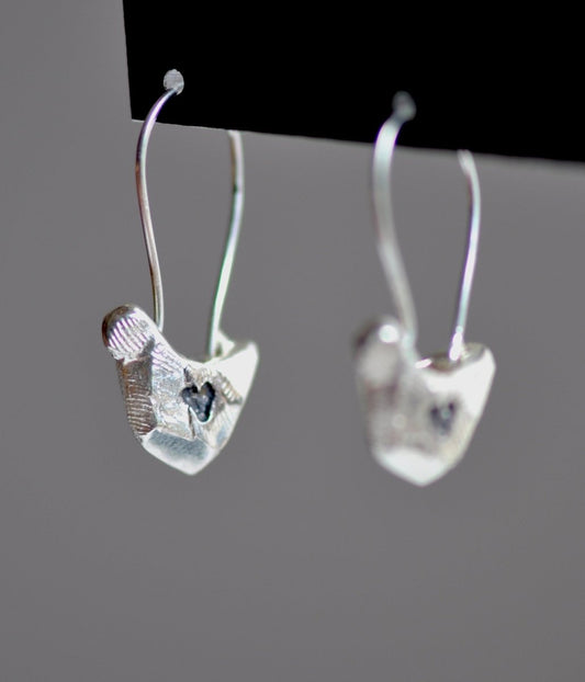 Handmade sterling silver bird charm earrings, whimsical nature jewelry, made in Barcelona