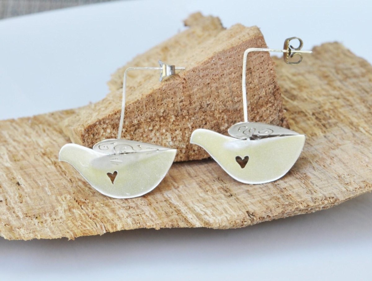 Dove Earrings | Handmade Sterling Silver Bird Dangle Earrings with Heart Detail - The Jewels You love