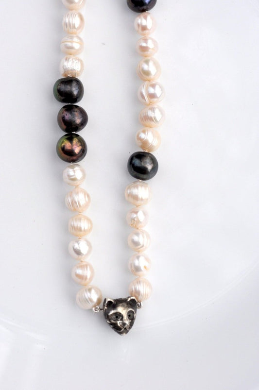 Handmade black and white freshwater pearl necklace with sterling silver cat charm and dark patina, unique cat jewelry