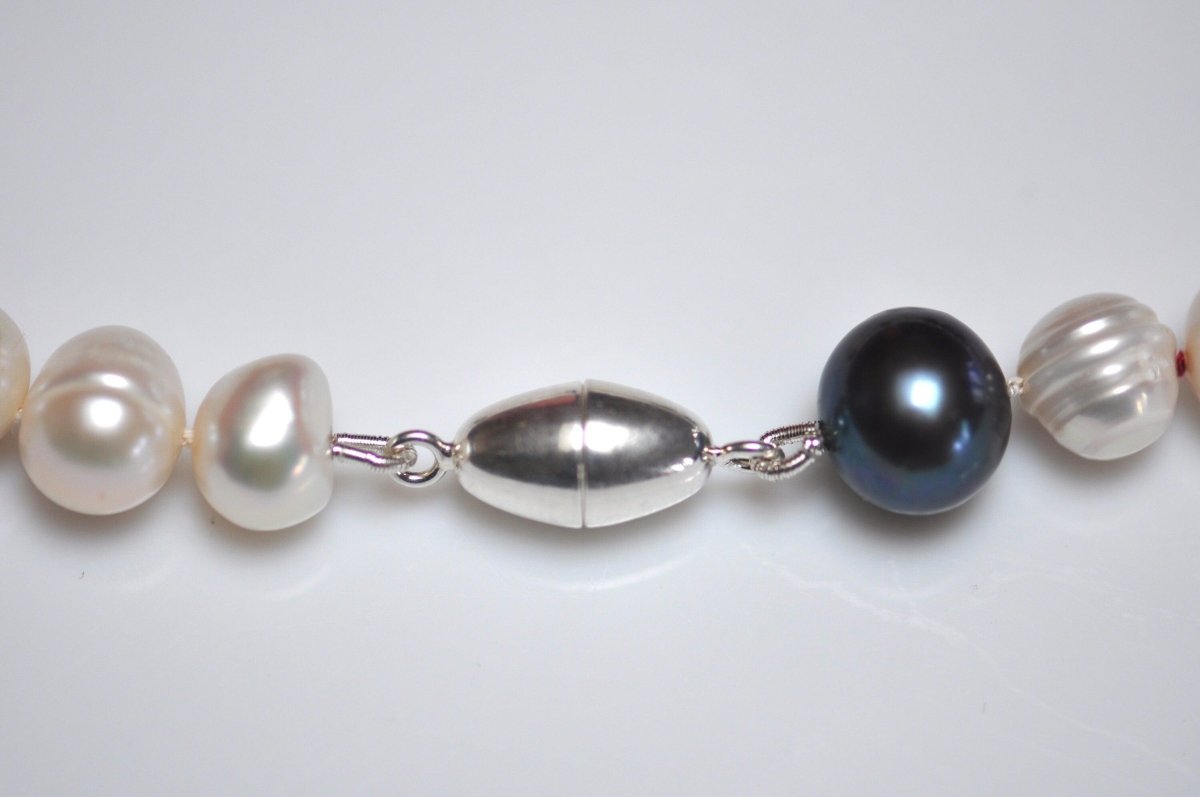 Handmade black and white freshwater pearl necklace with sterling silver cat charm and dark patina, unique cat jewelry