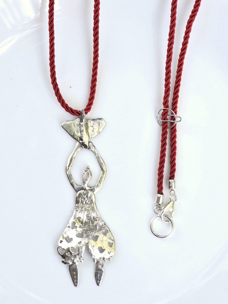 Handmade Sterling silver whimsical woman with bird pendant, red cord necklace, wearable sculpture jewelry, made in Barcelona