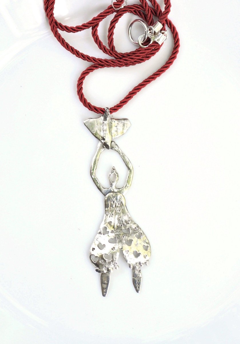 Handmade Sterling silver whimsical woman with bird pendant, red cord necklace, wearable sculpture jewelry, made in Barcelona